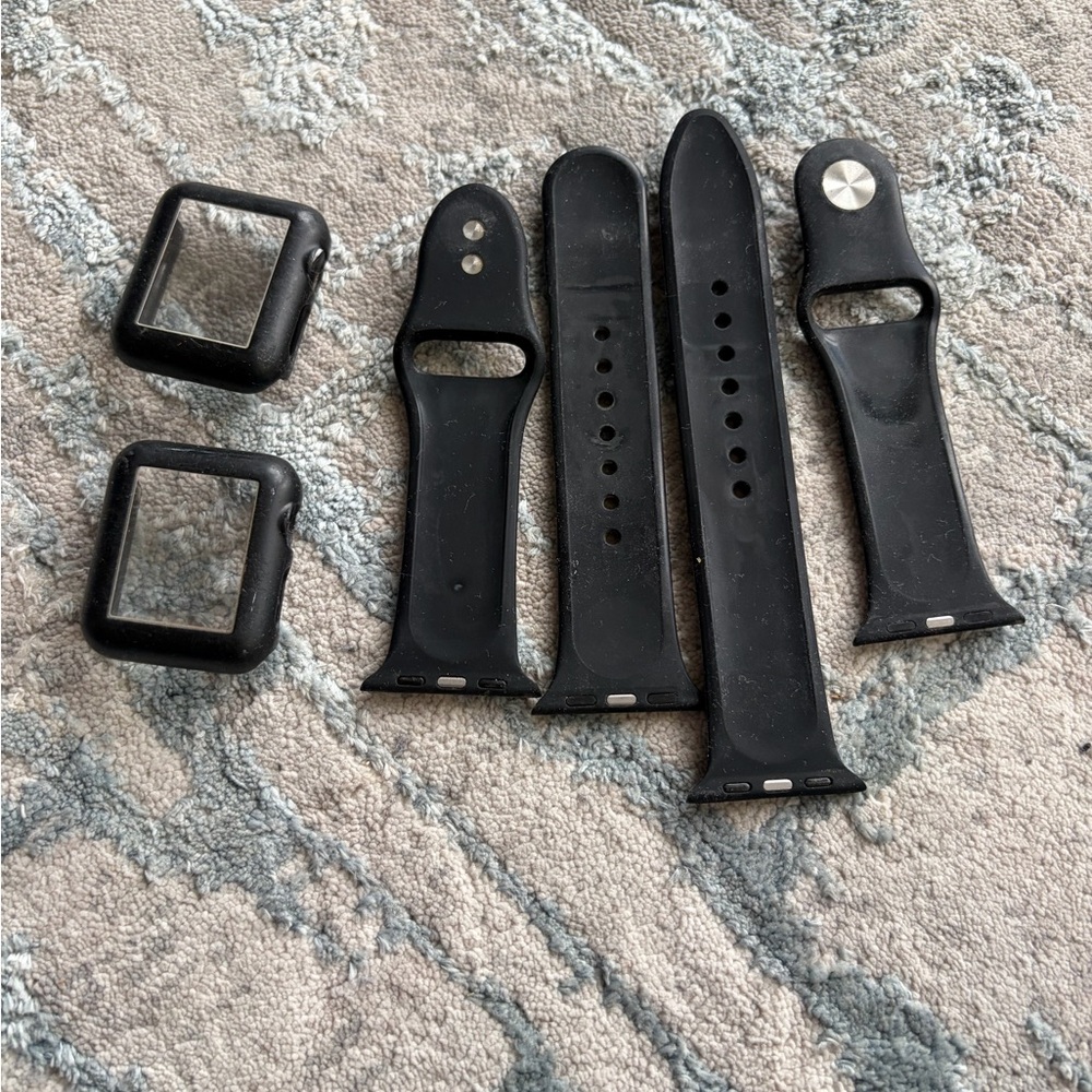 Used Black Silicone Watch Bands and Protective Cases